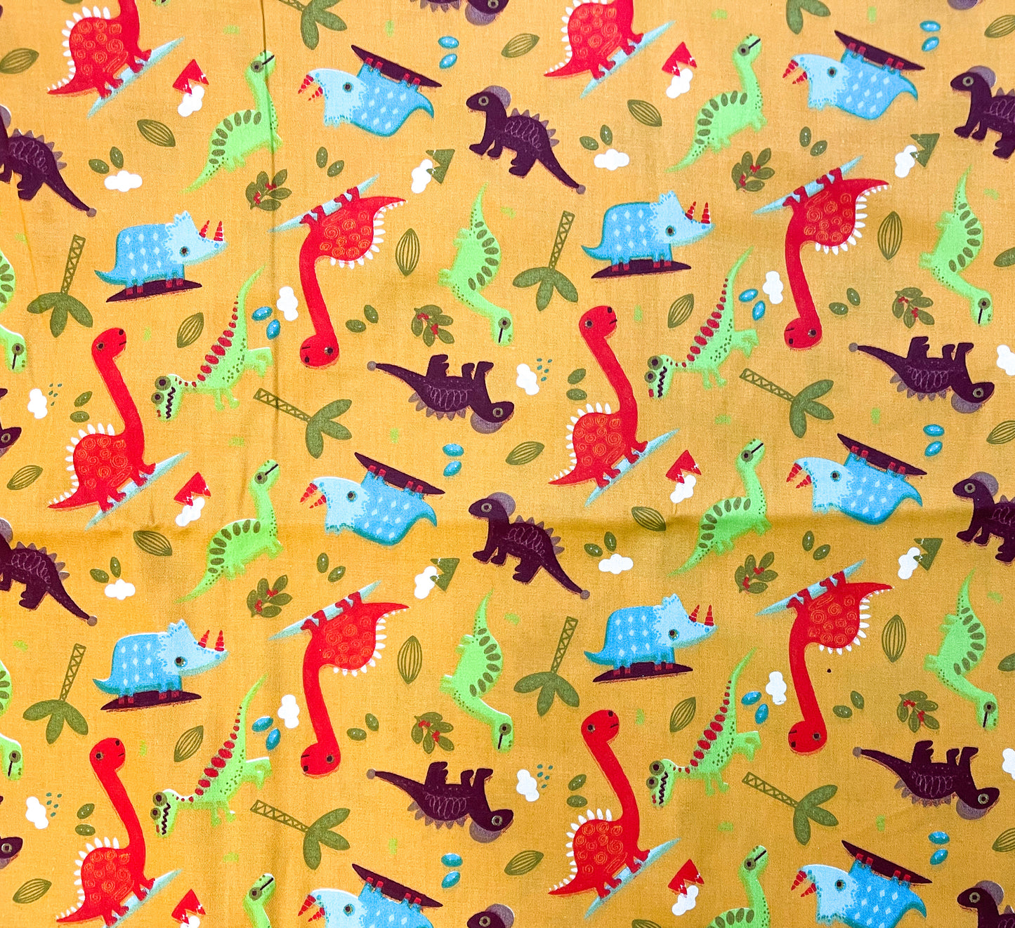 Dinos and trees on yellow 24” end cut