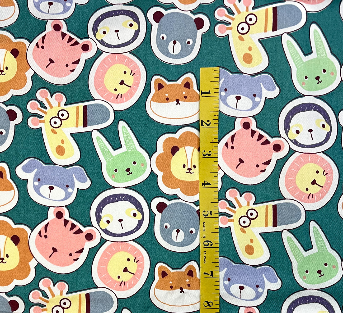 Animal heads on teal