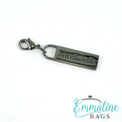 Emmaline brand Zipper pull “Handmade”