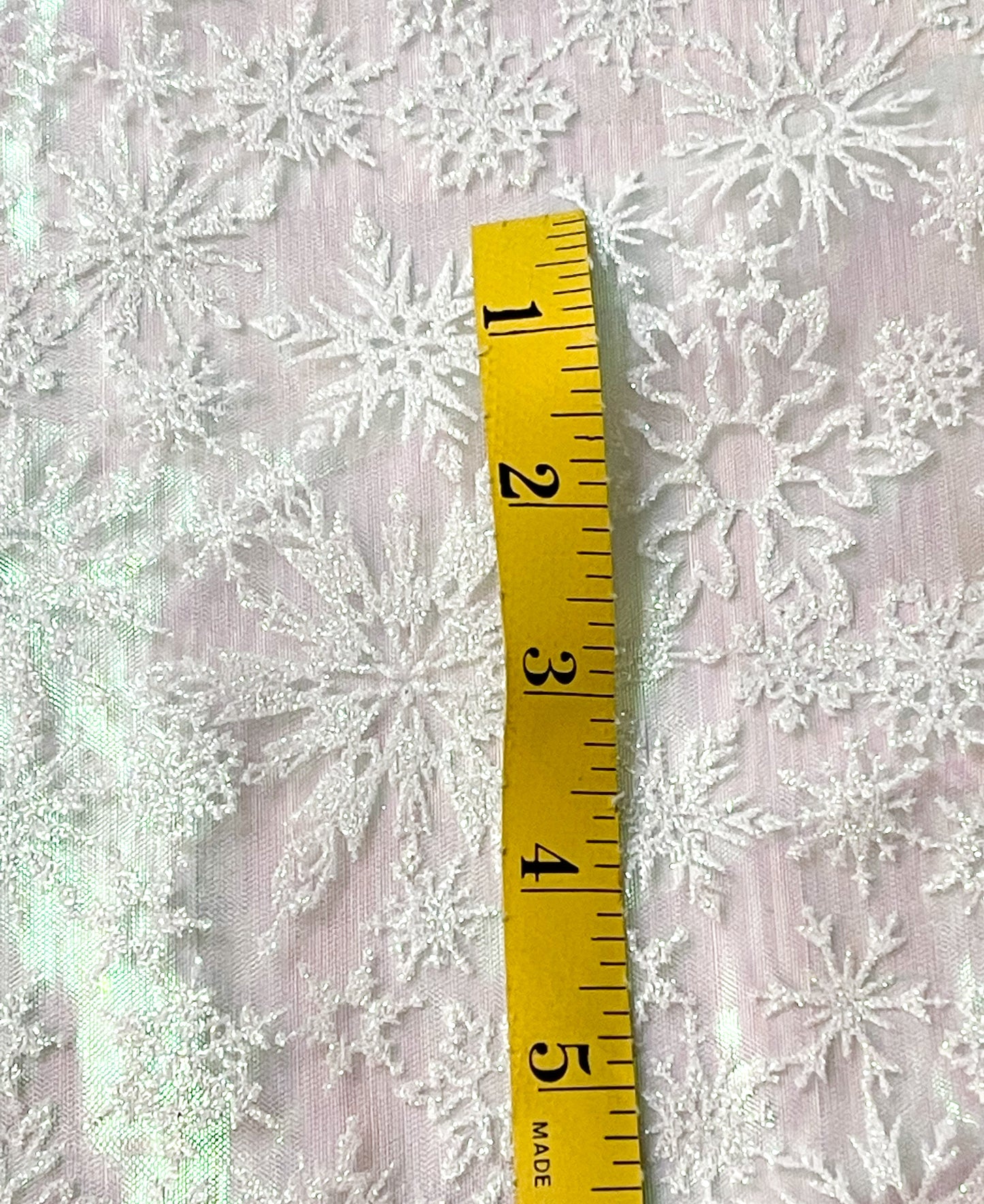 Clearance -clear shimmer with white glitter snowflakes-yardage