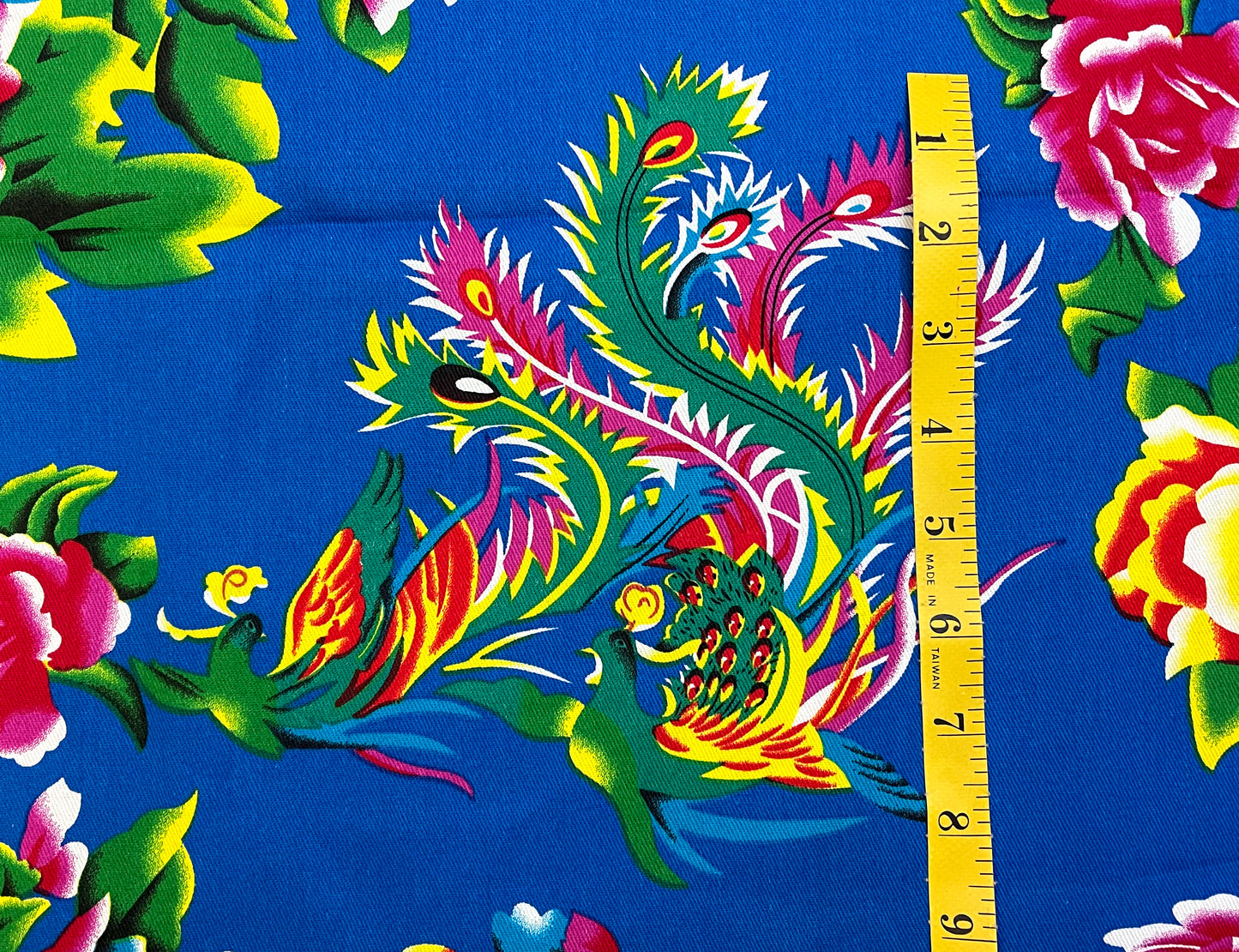 Phoenix with peonies on blue