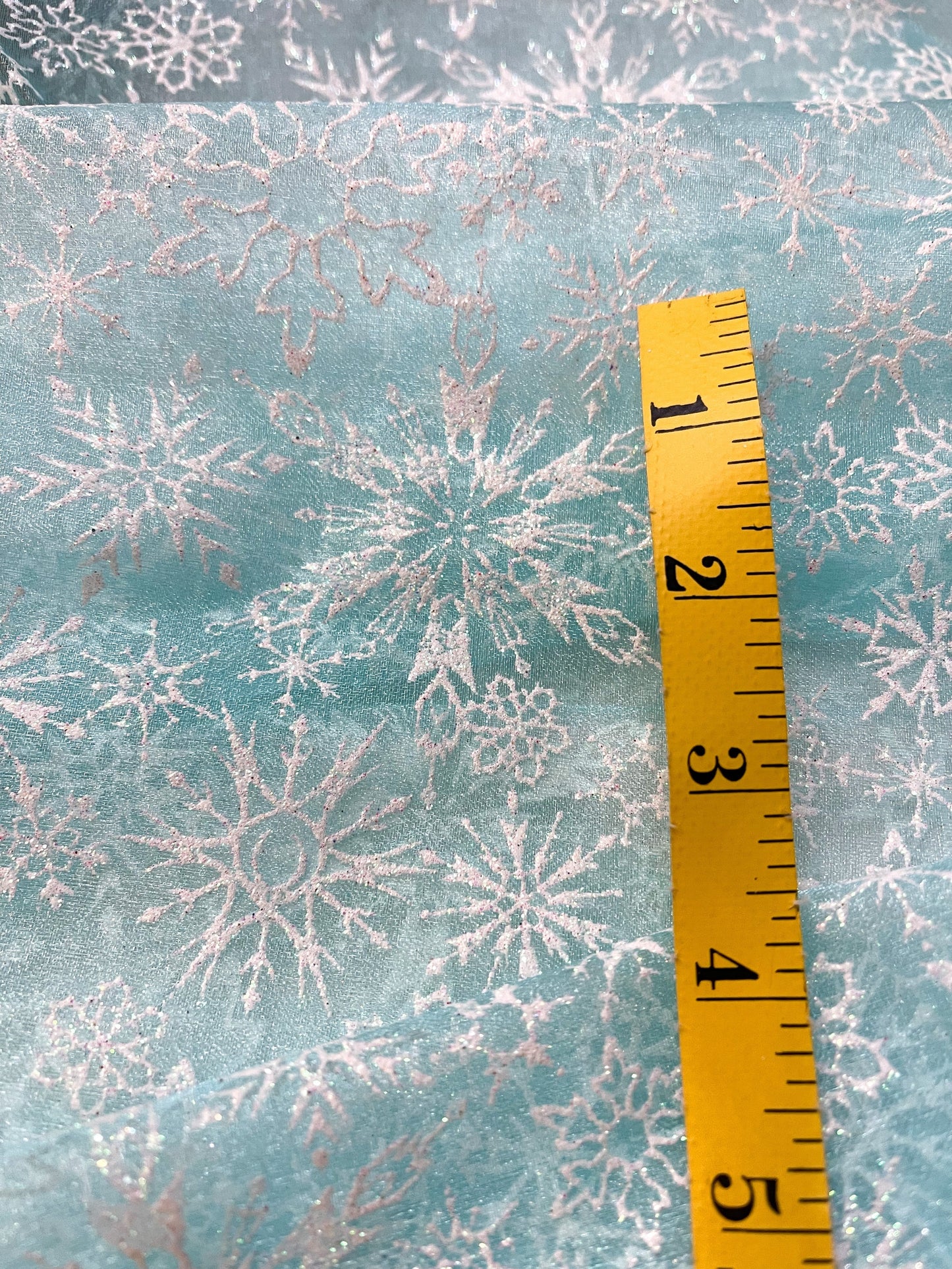 Clearance -pale blue shimmer with white glitter snowflakes flawed precut