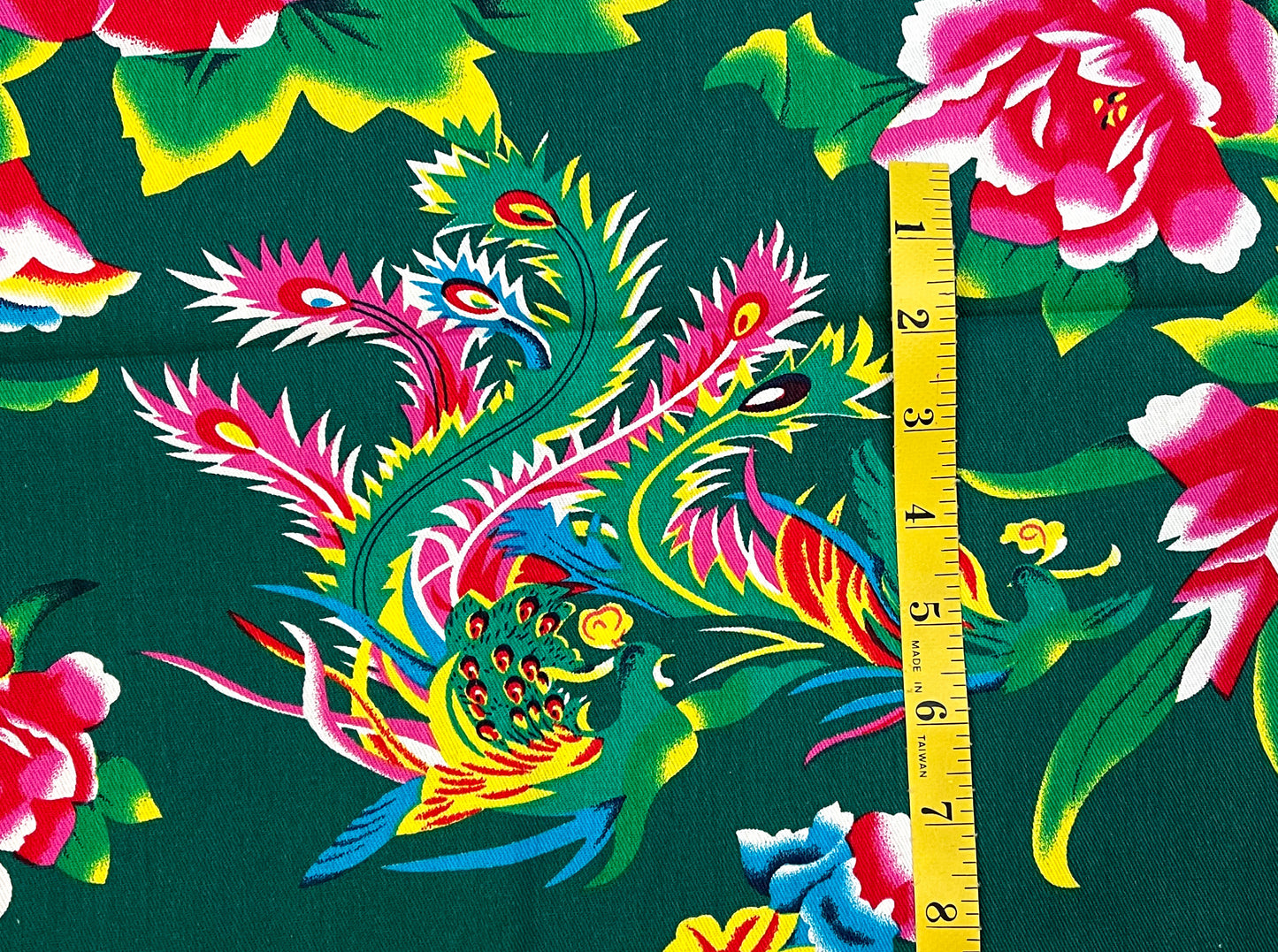 Phoenix with peonies on green