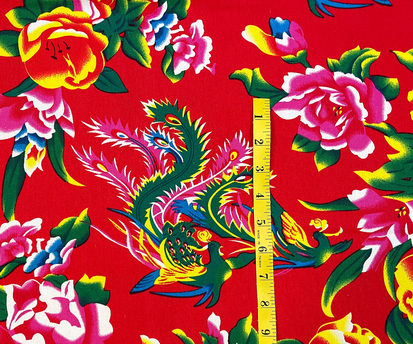 Phoenix with peonies on red